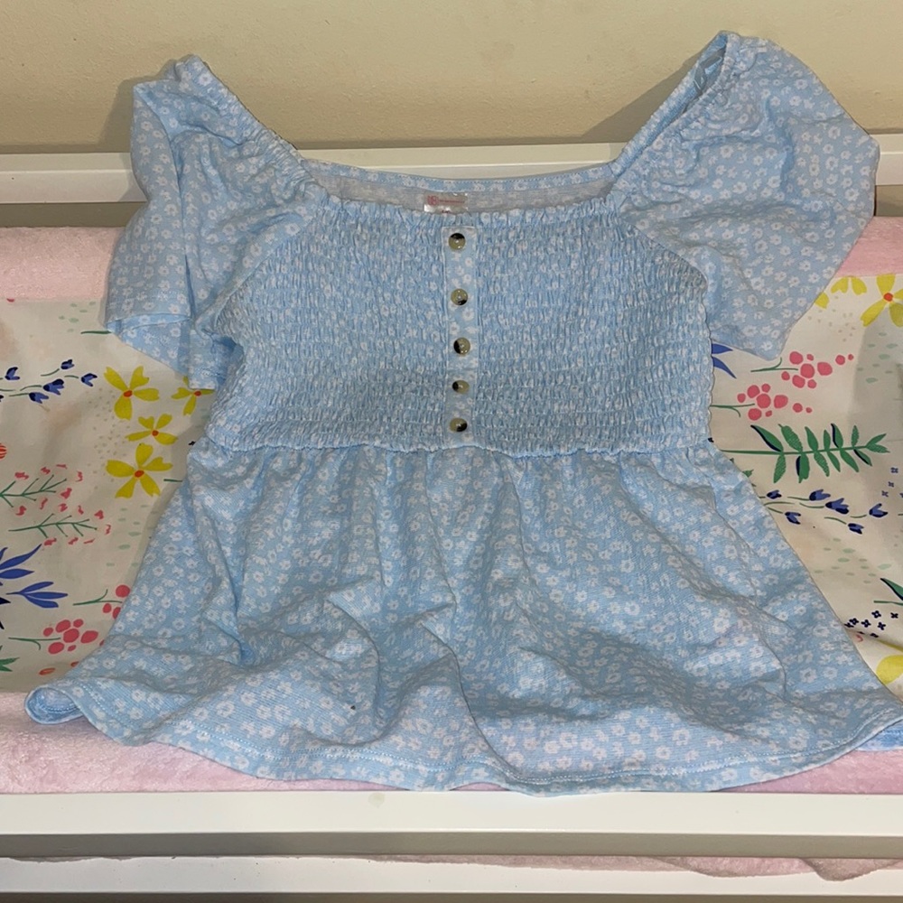 Blue top with white flowers